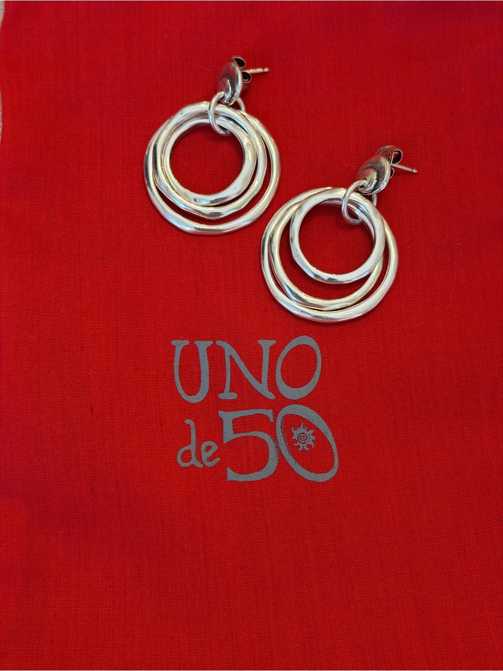 UNO de 50 Polished Silver Triple Hoop Drop Earrings